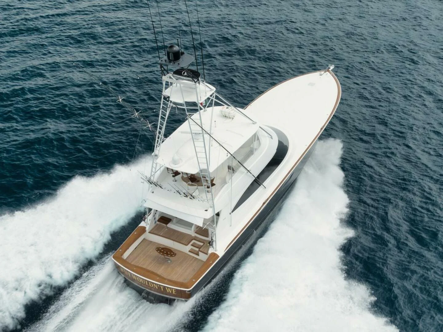 a boat on the water aboard WHY WOULDN'T WE Yacht for Sale