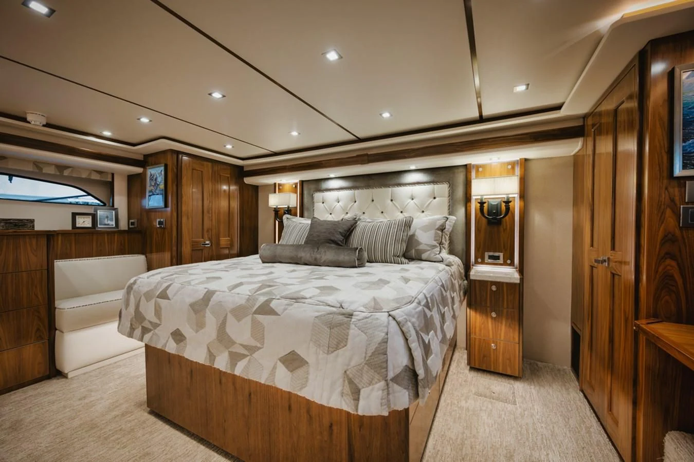 a large bedroom with a large bed aboard WHY WOULDN'T WE Yacht for Sale