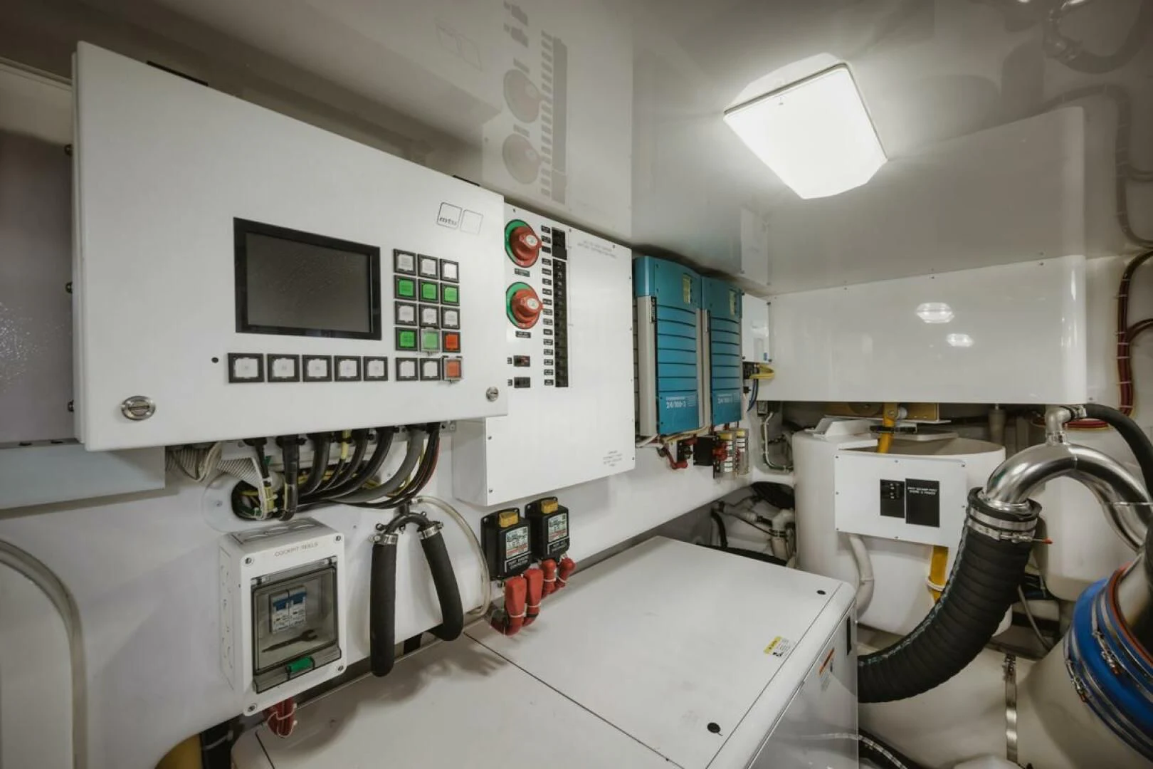 a room with a machine aboard WHY WOULDN'T WE Yacht for Sale