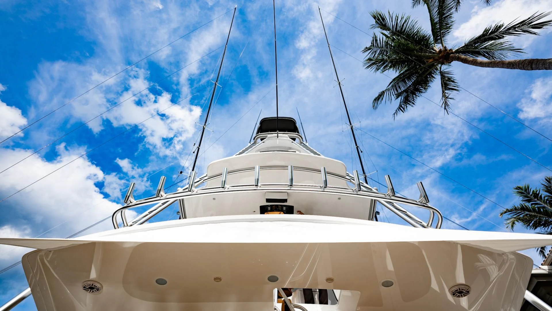a white boat on a sunny day aboard WHY WOULDN'T WE Yacht for Sale
