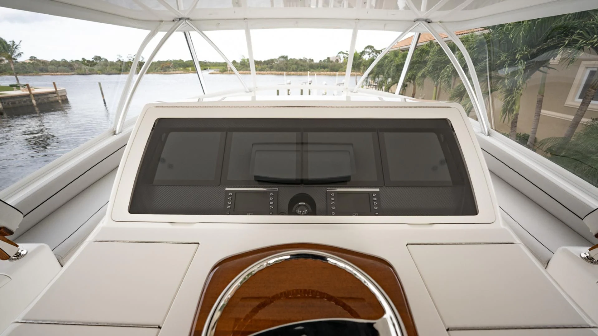 a white car with a screen aboard WHY WOULDN'T WE Yacht for Sale