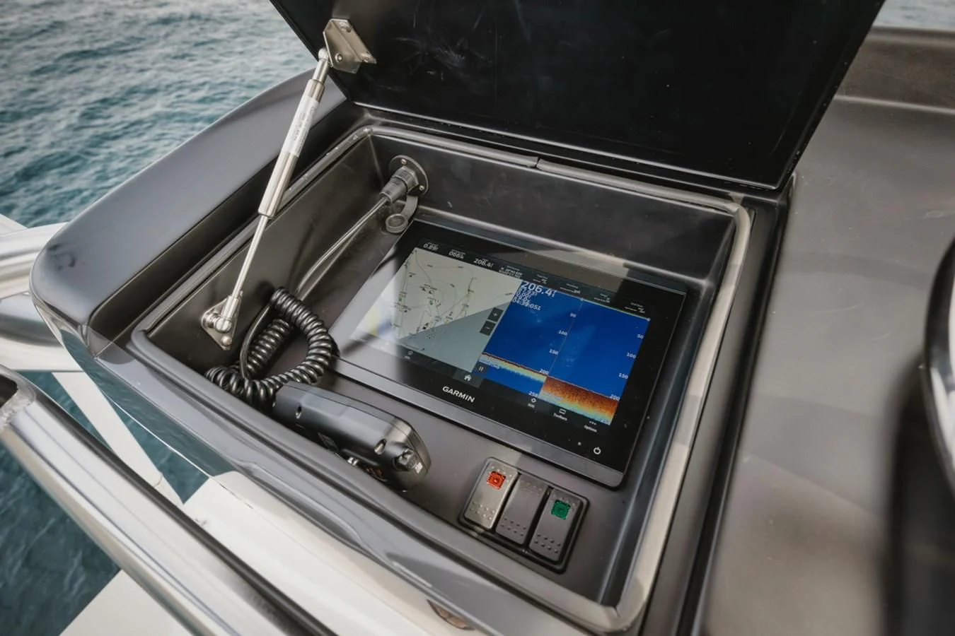 a car with a screen on the dashboard aboard WHY WOULDN'T WE Yacht for Sale