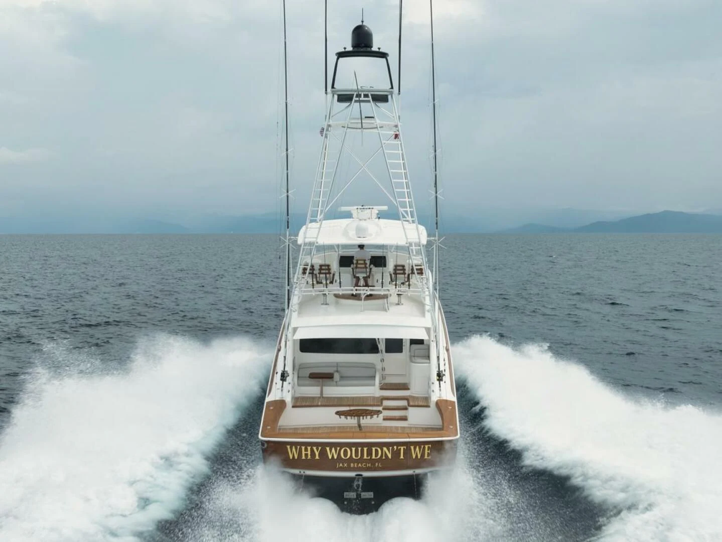 a boat on the water aboard WHY WOULDN'T WE Yacht for Sale