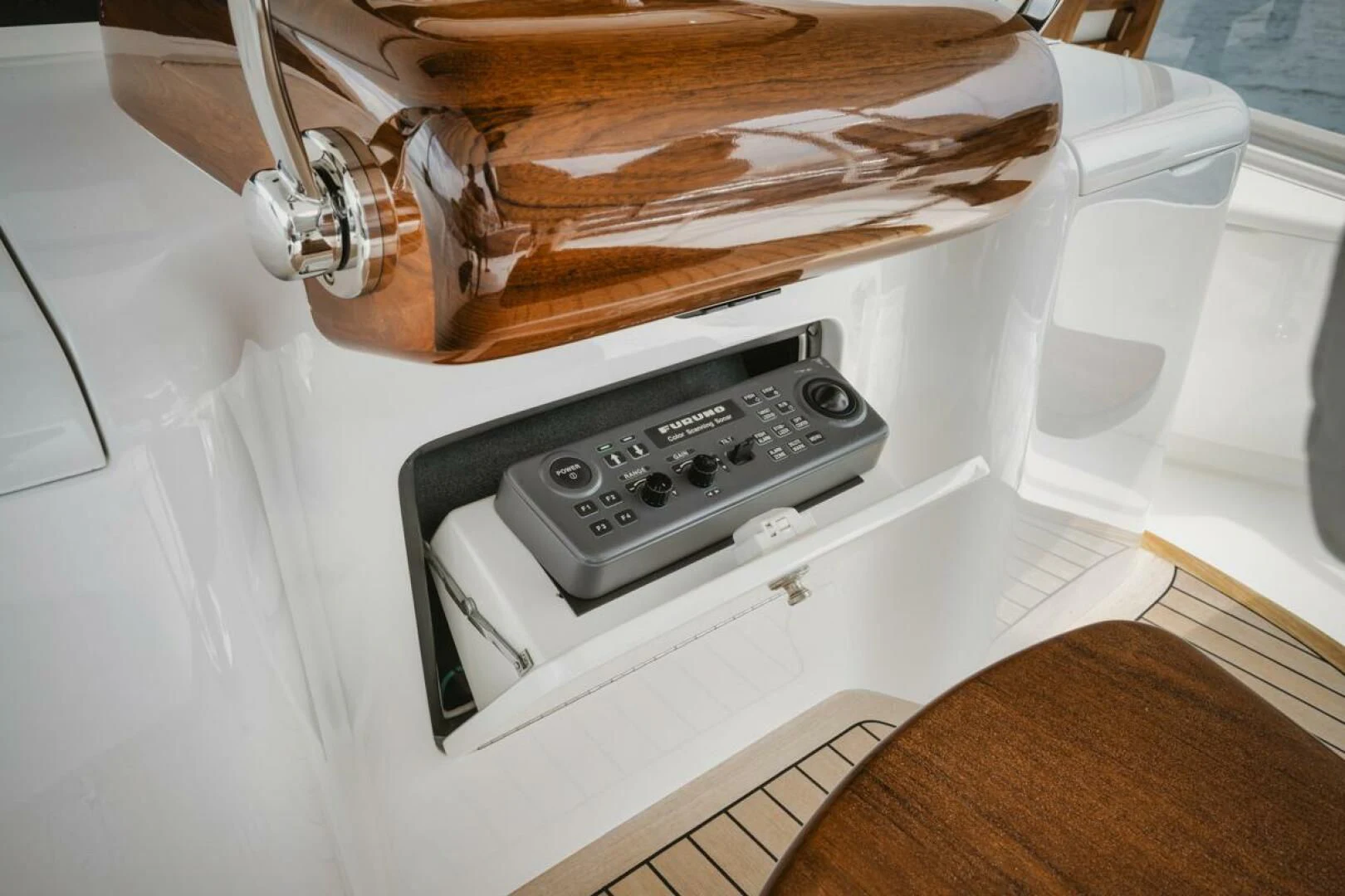 a white machine with a cord aboard WHY WOULDN'T WE Yacht for Sale