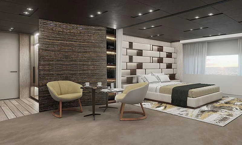 a room with a bed and a chair aboard LION Yacht for Sale
