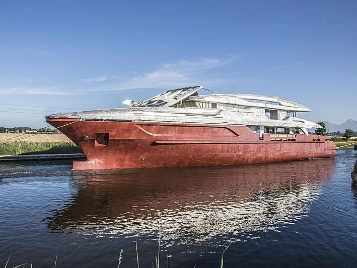 a large boat on the water aboard LION Yacht for Sale