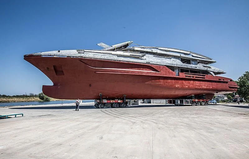 a large red ship aboard LION Yacht for Sale