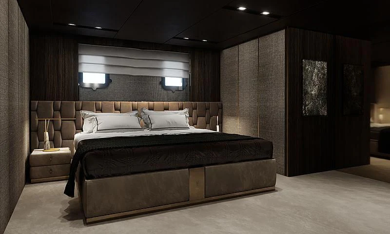 a large bed in a room aboard LION Yacht for Sale