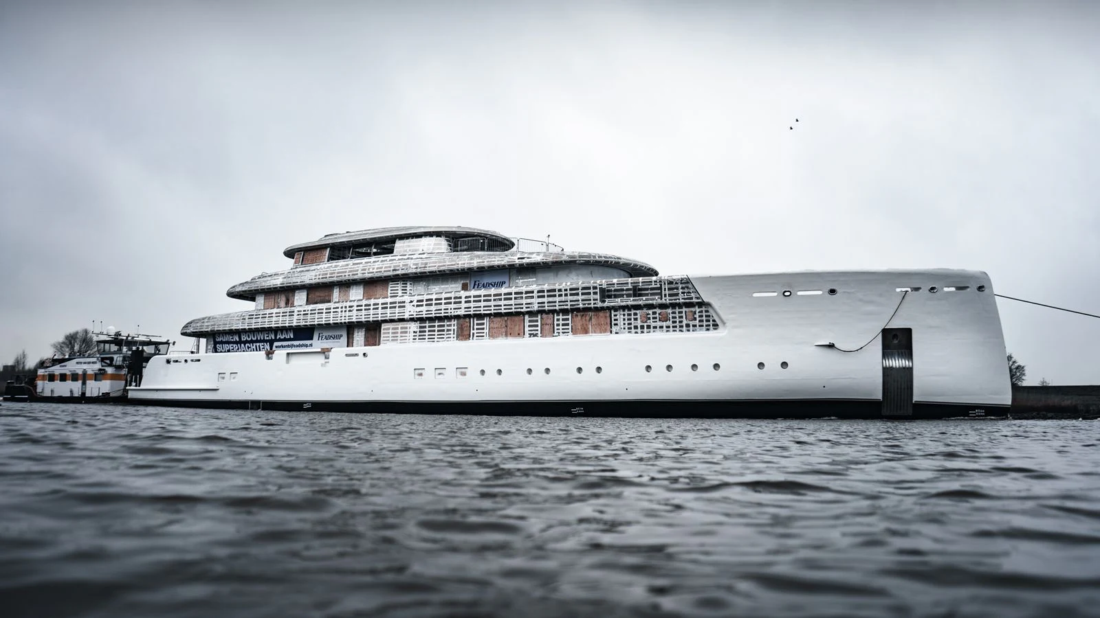 a large cruise ship in the water aboard SIBELLE Yacht for Sale