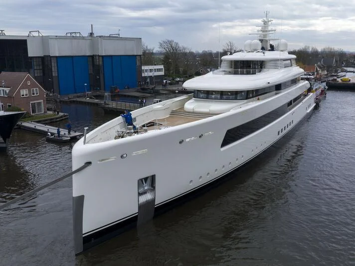 a large white boat docked aboard SIBELLE Yacht for Sale