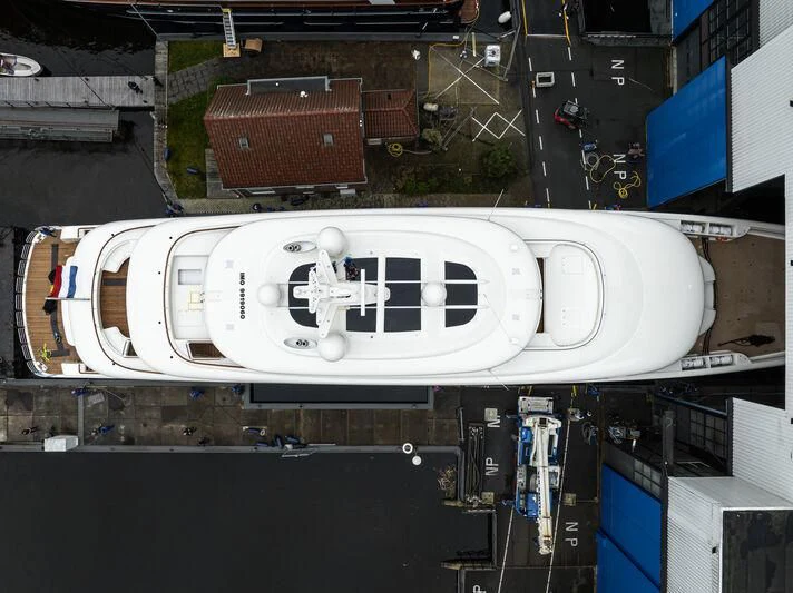 a large white sign with a white circle on it aboard SIBELLE Yacht for Sale