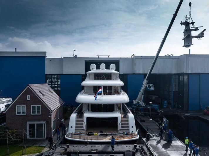 a large white boat docked aboard SIBELLE Yacht for Sale