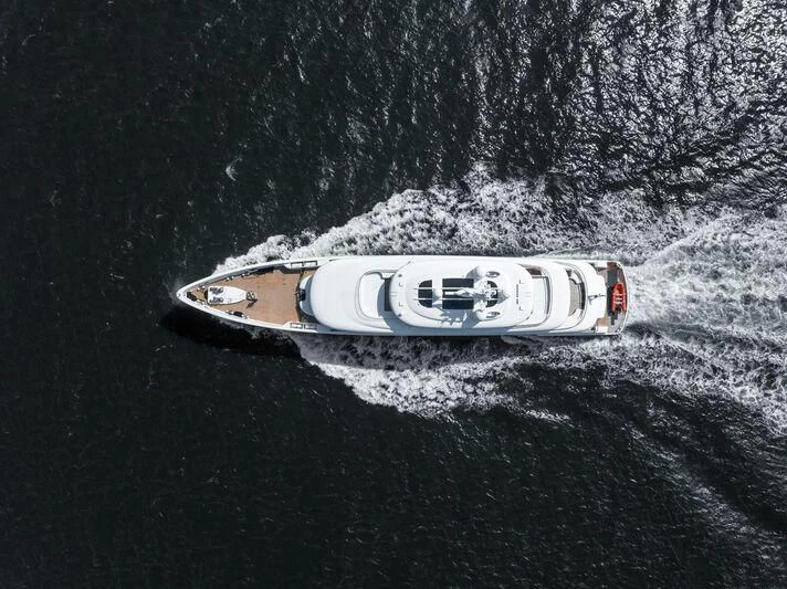 a person in a white suit aboard SIBELLE Yacht for Sale