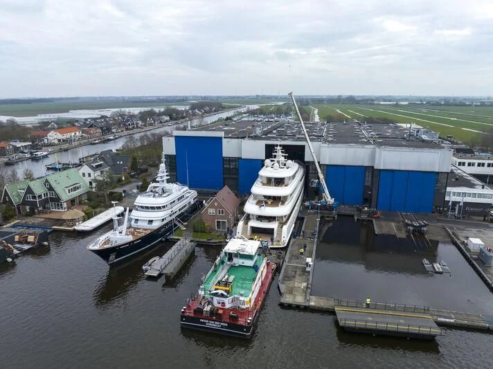 a port with boats and buildings aboard SIBELLE Yacht for Sale