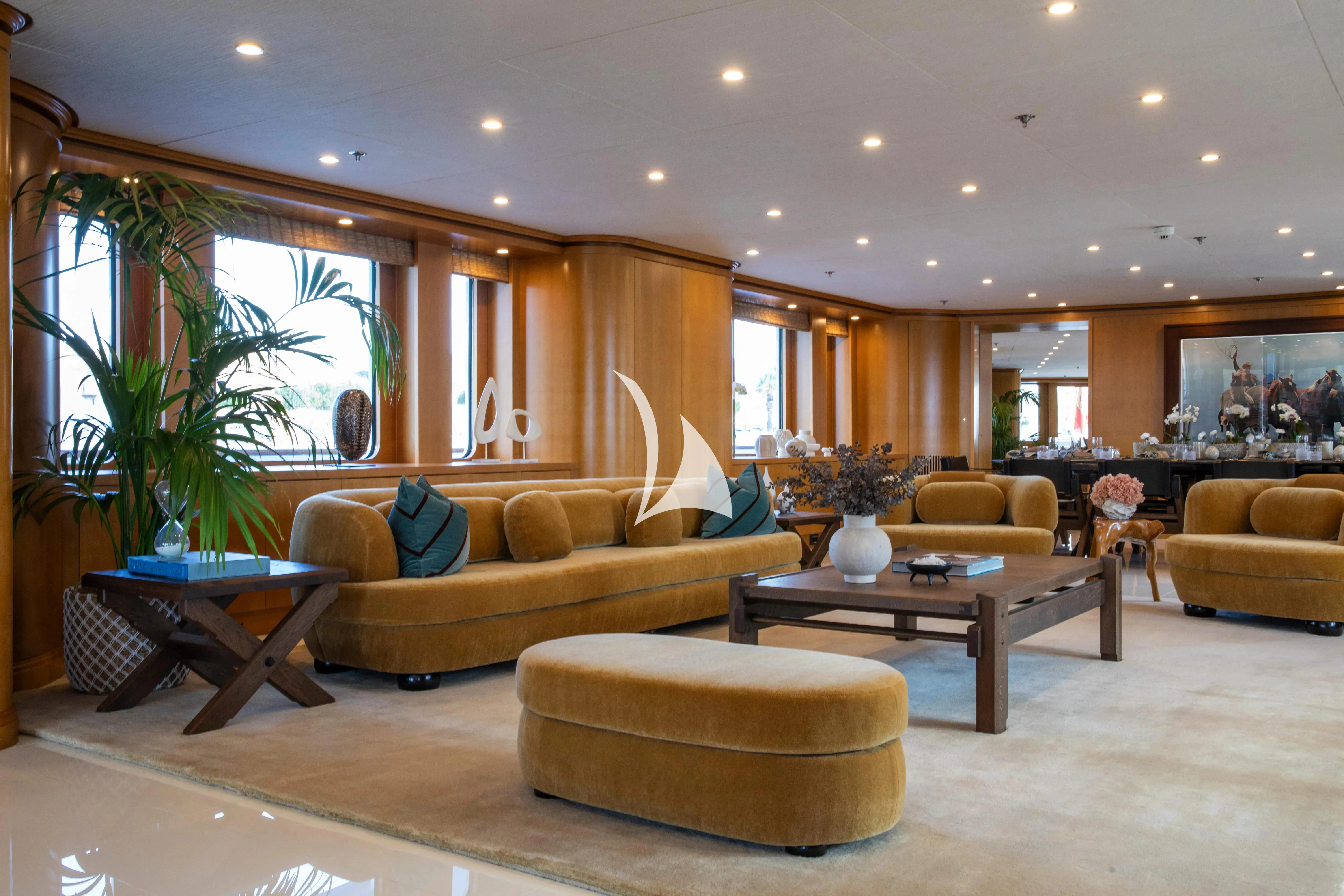 a living room with a large window aboard TREEHOUSE Yacht for Sale