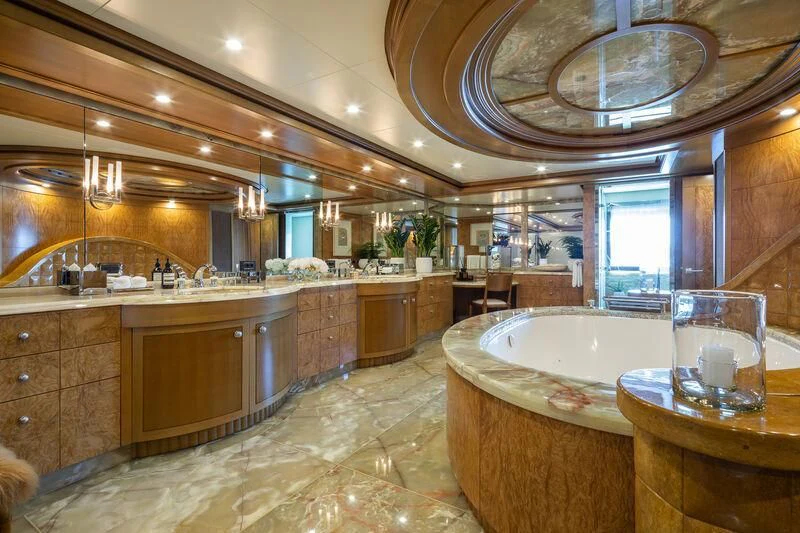 a large bathroom with a large marble countertop aboard TREEHOUSE Yacht for Sale
