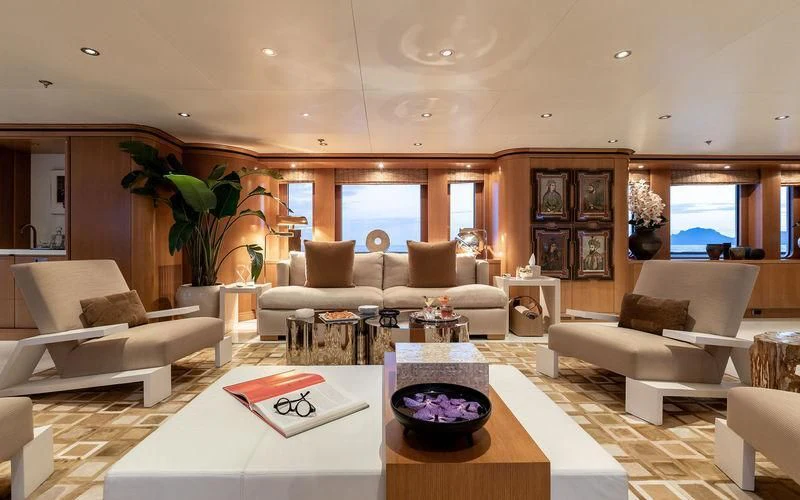 a living room with a large window aboard TREEHOUSE Yacht for Sale