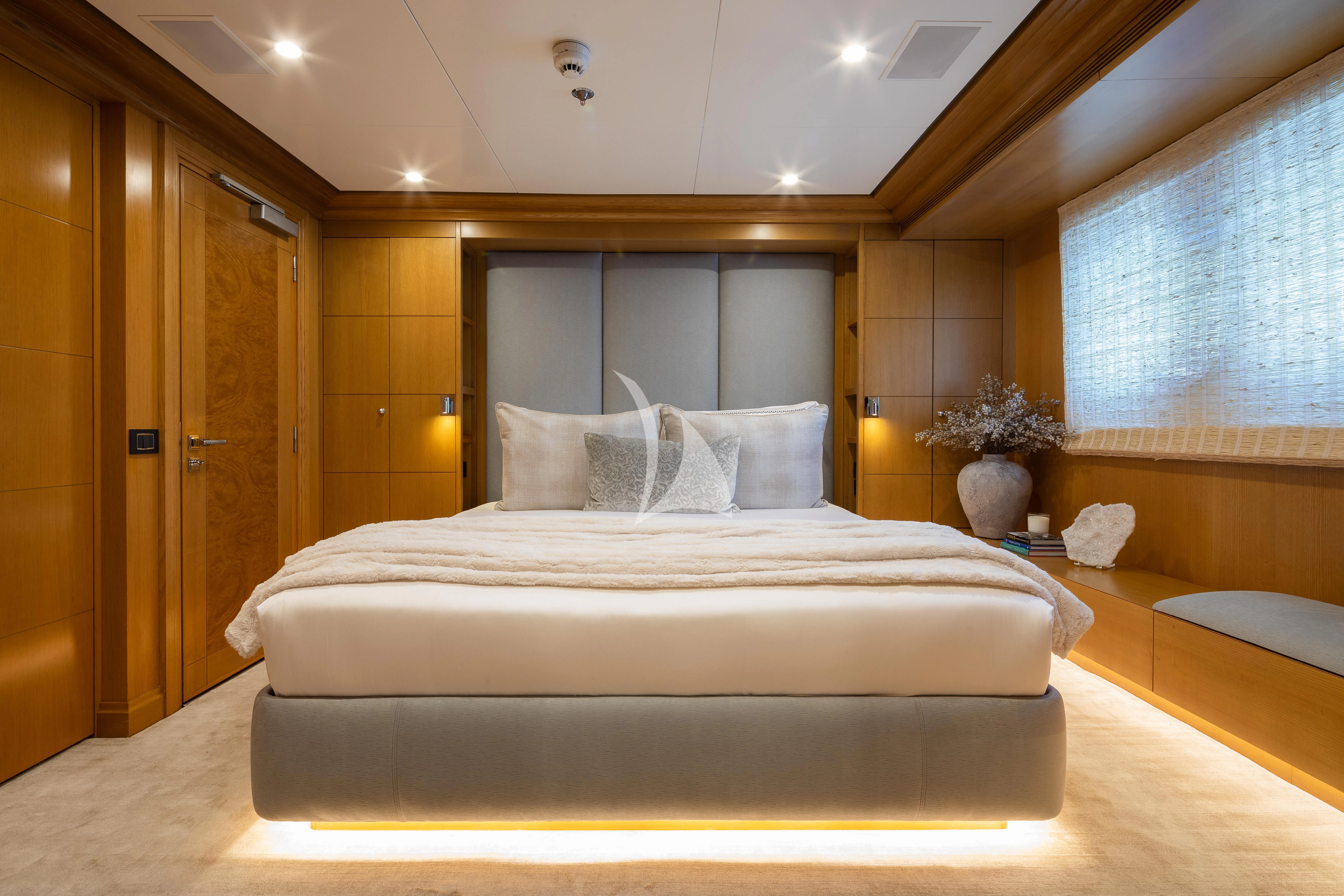 a bed in a room aboard TREEHOUSE Yacht for Sale