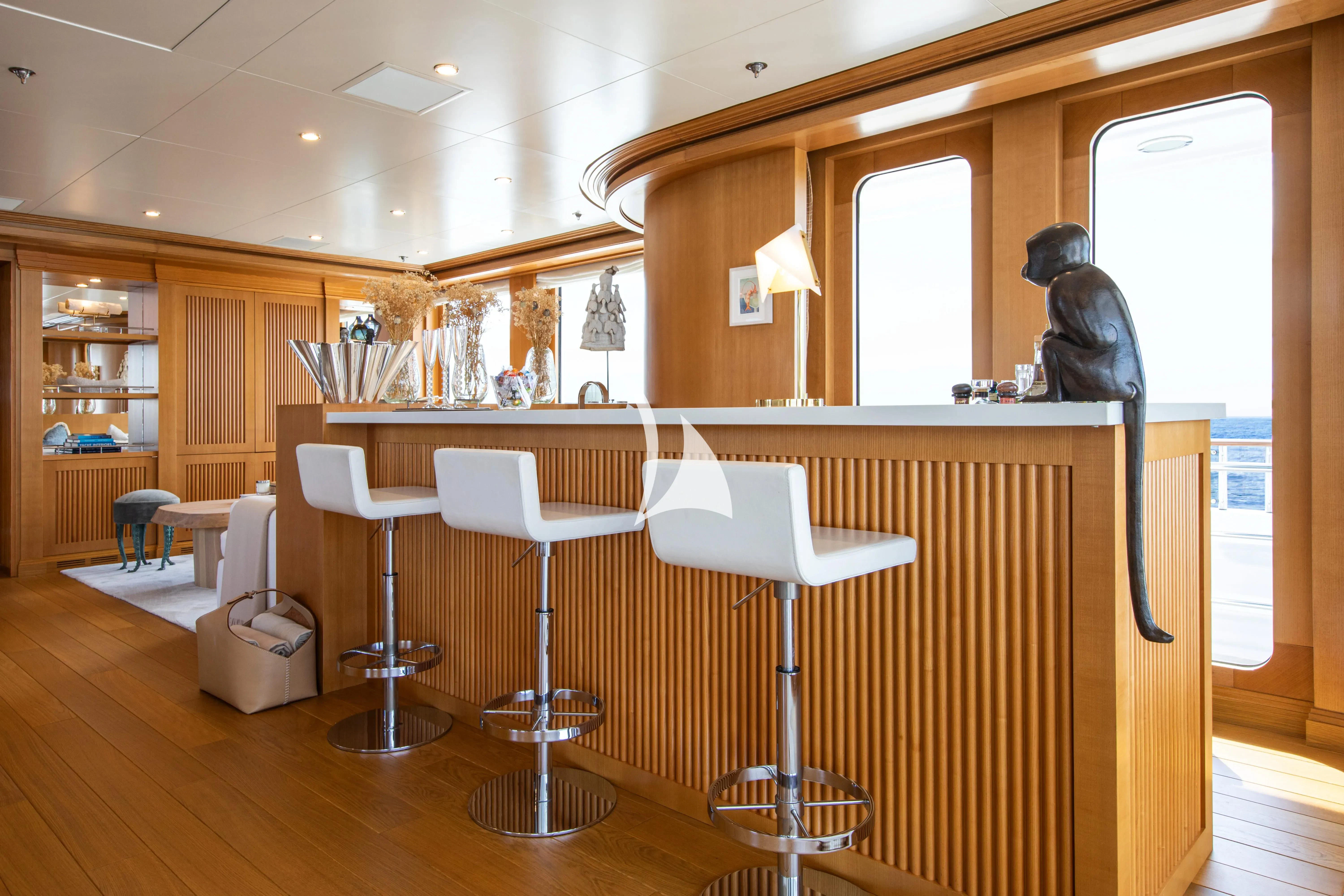 a person sitting at a desk aboard TREEHOUSE Yacht for Sale