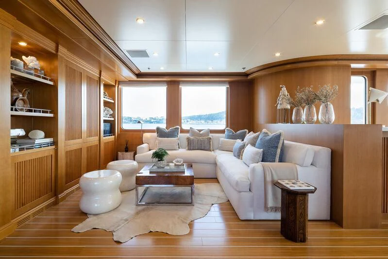 a living room with a large window aboard TREEHOUSE Yacht for Sale