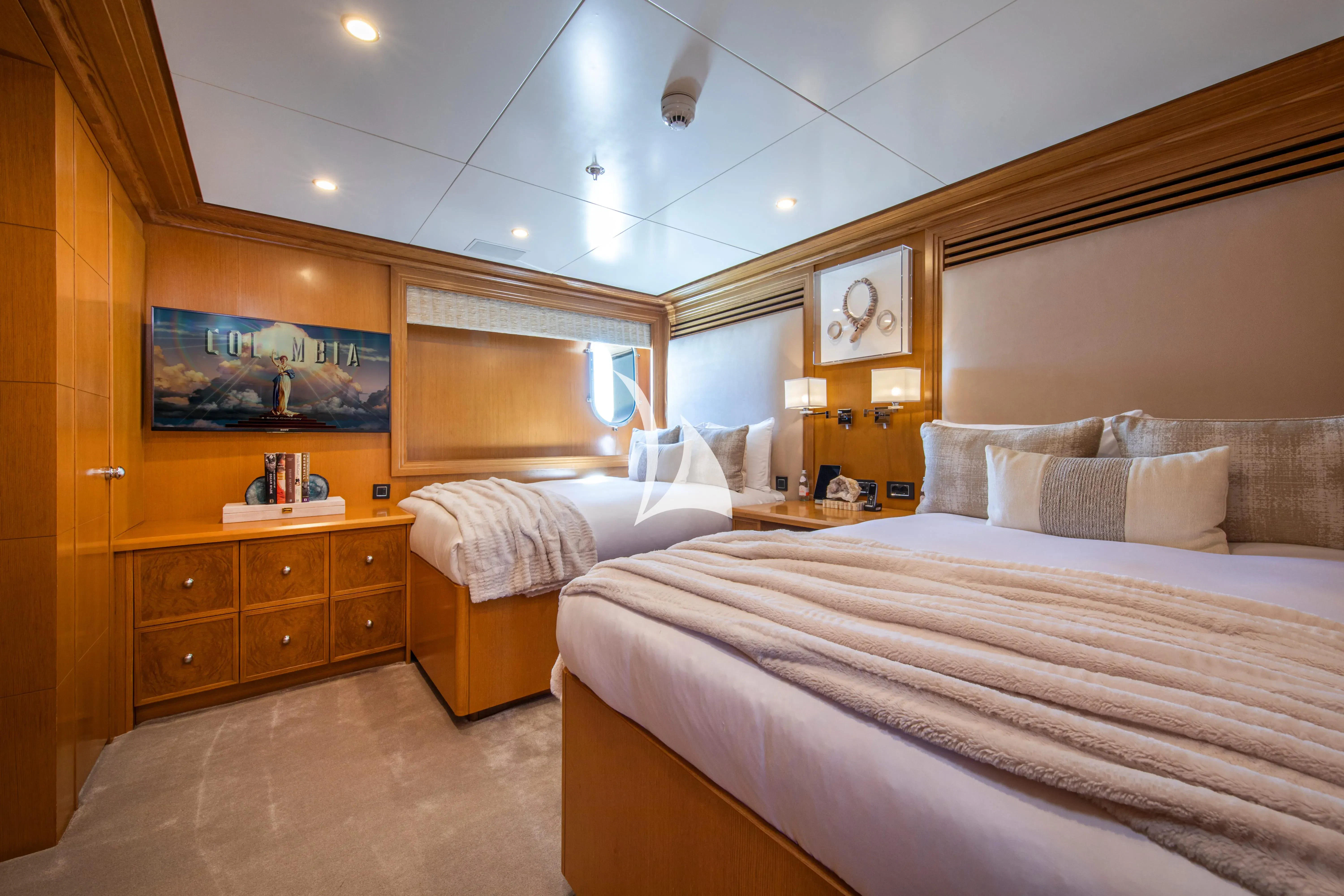 a room with two beds aboard TREEHOUSE Yacht for Sale
