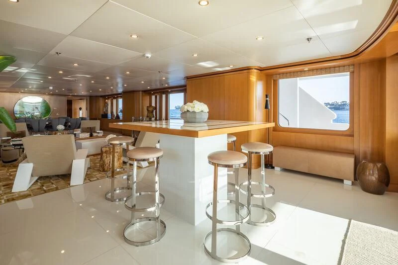 a room with stools and stools aboard TREEHOUSE Yacht for Sale