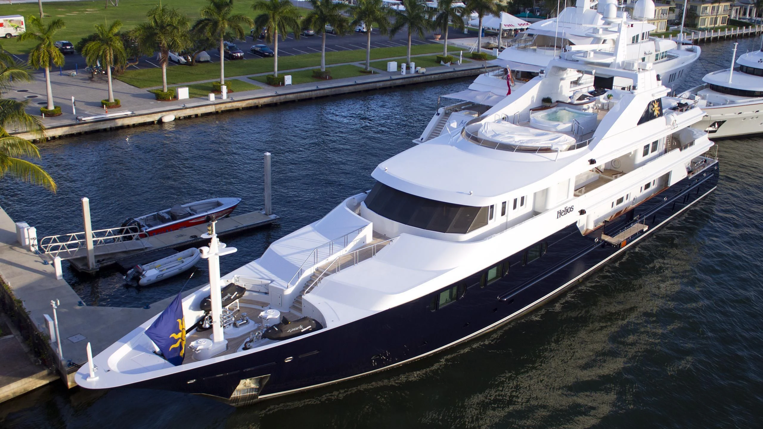 a large boat docked at a pier aboard TREEHOUSE Yacht for Sale