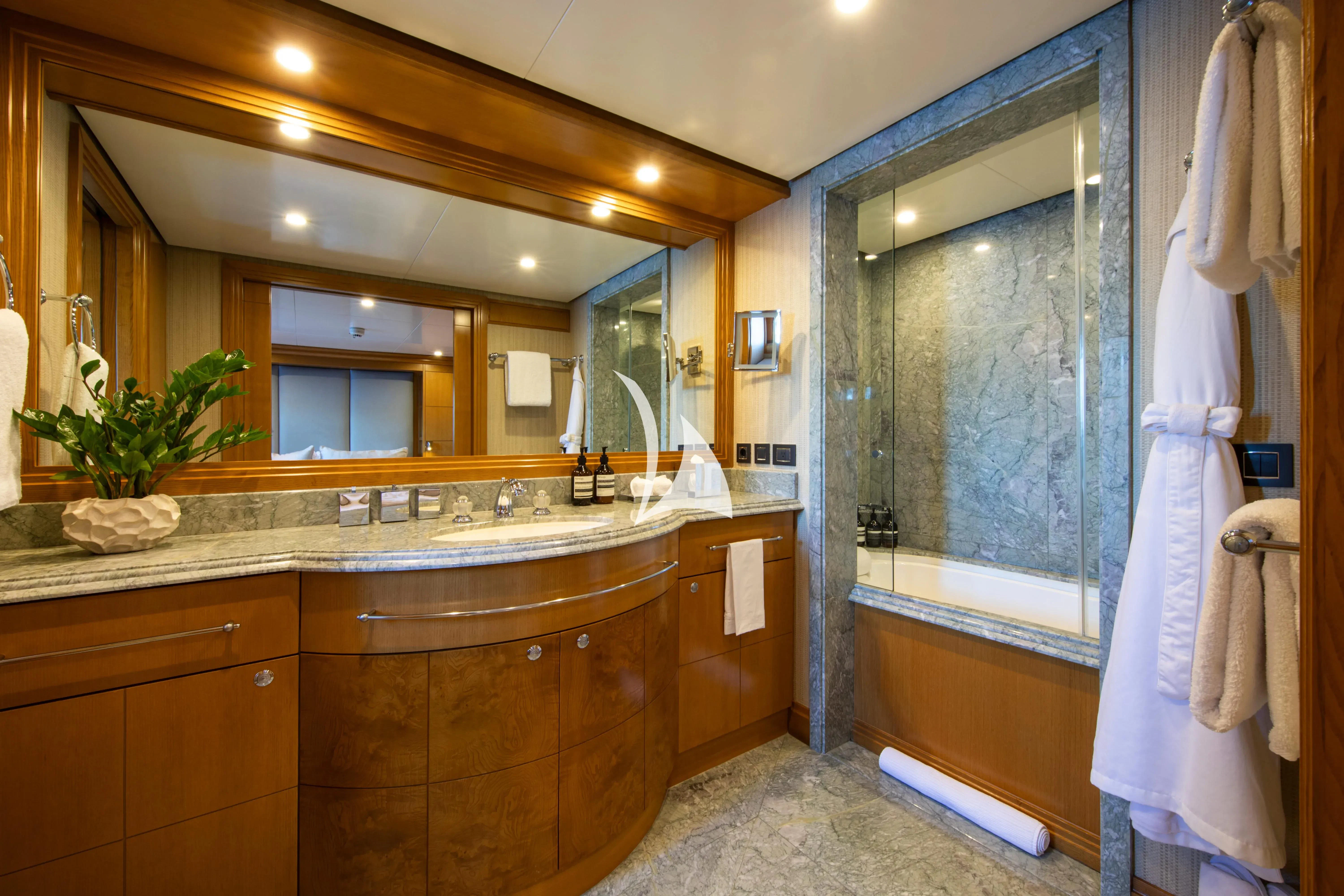 a bathroom with a large mirror aboard TREEHOUSE Yacht for Sale