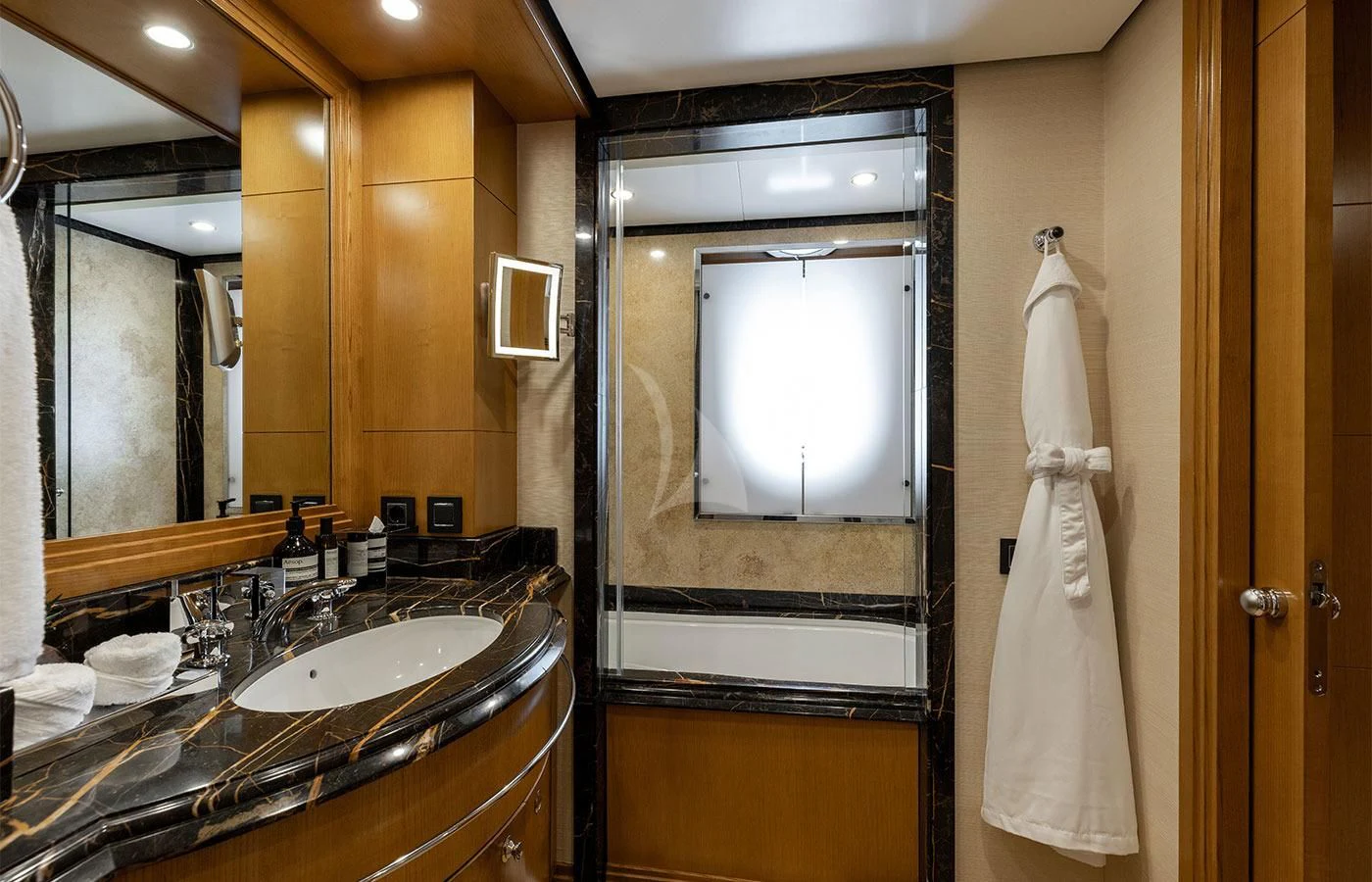 a bathroom with a large mirror aboard TREEHOUSE Yacht for Sale