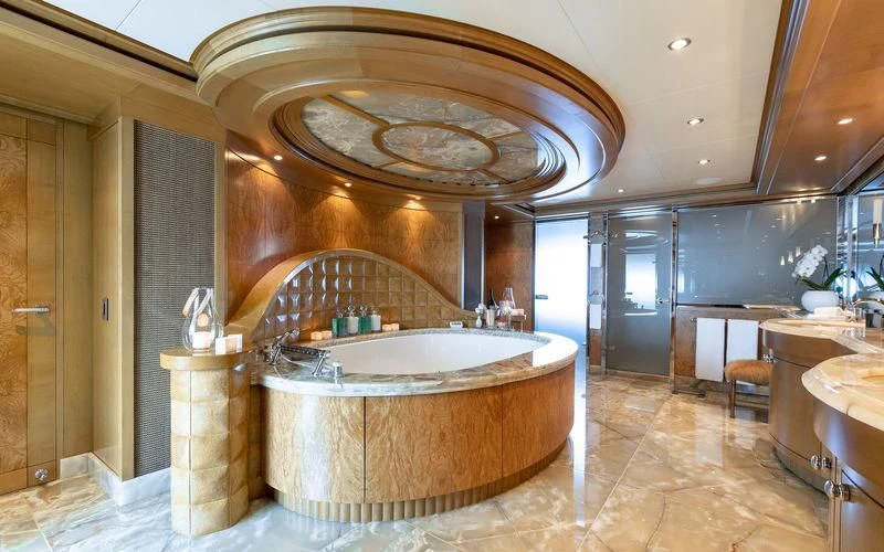 a large bathroom with a large marble sink aboard TREEHOUSE Yacht for Sale