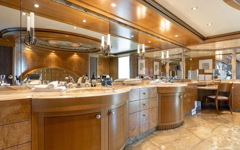 a large kitchen with a large fireplace aboard TREEHOUSE Yacht for Sale