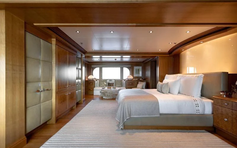 a room with a bed and a door aboard TREEHOUSE Yacht for Sale