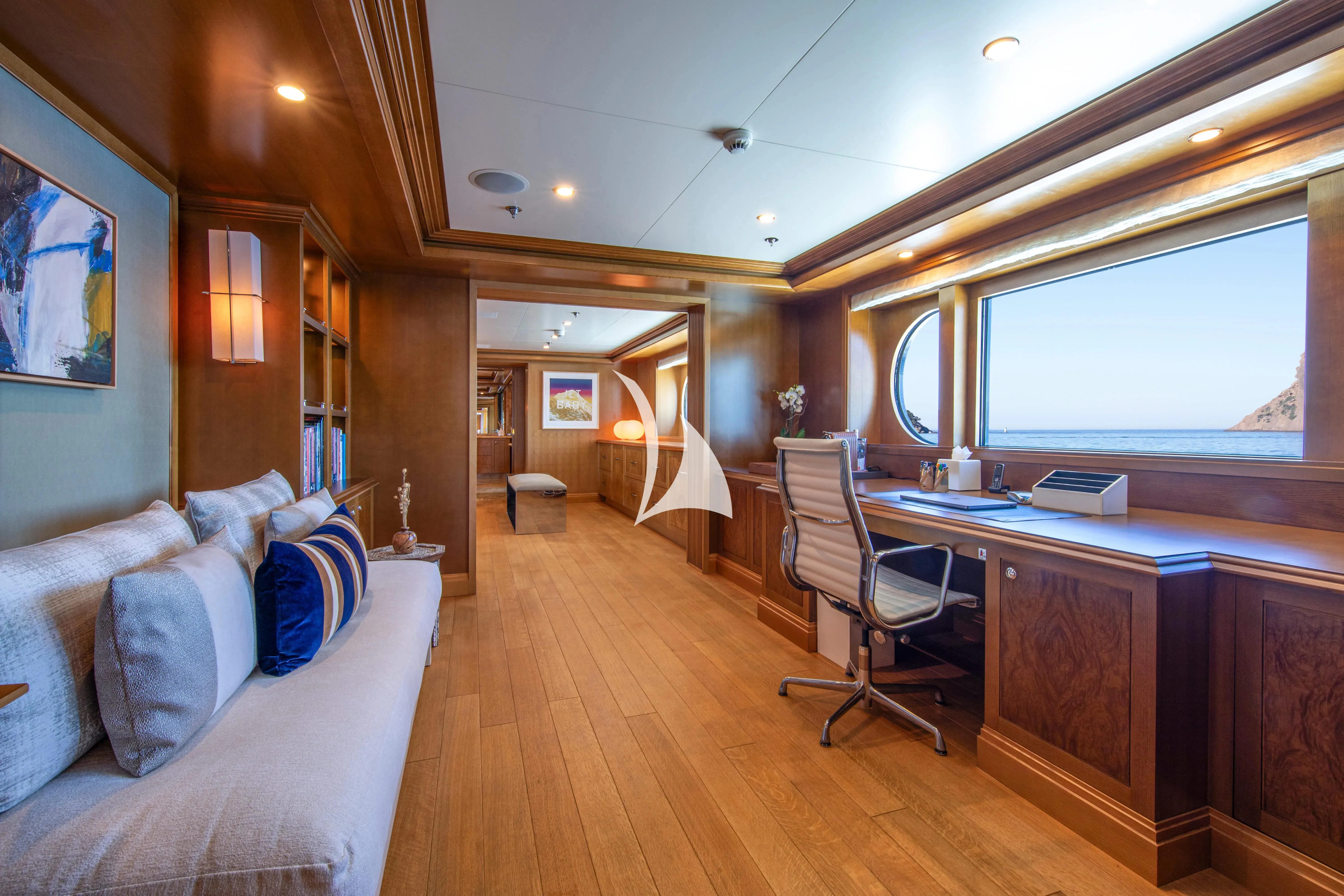 a large kitchen and living room aboard TREEHOUSE Yacht for Sale