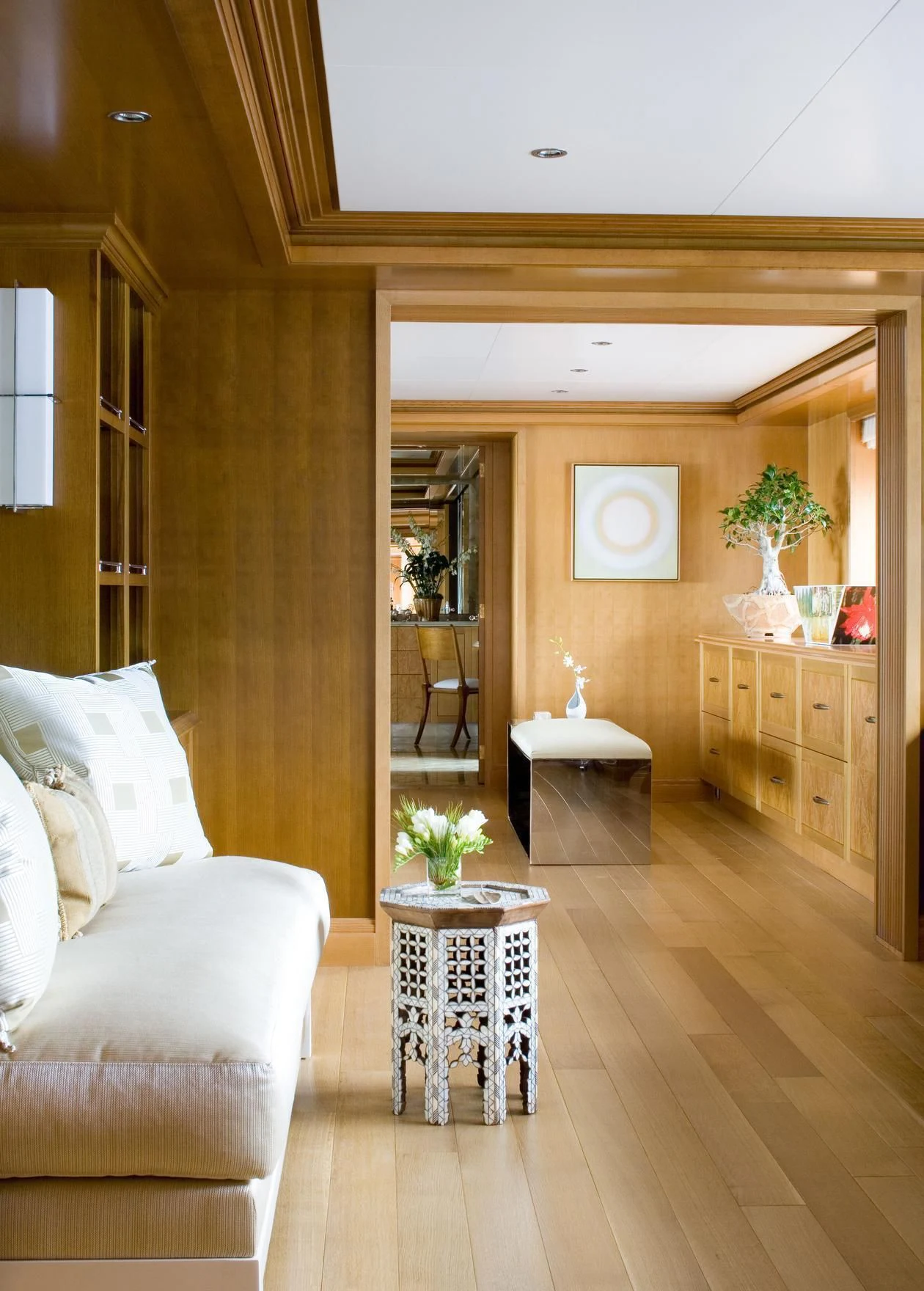 a living room with a wood floor aboard TREEHOUSE Yacht for Sale