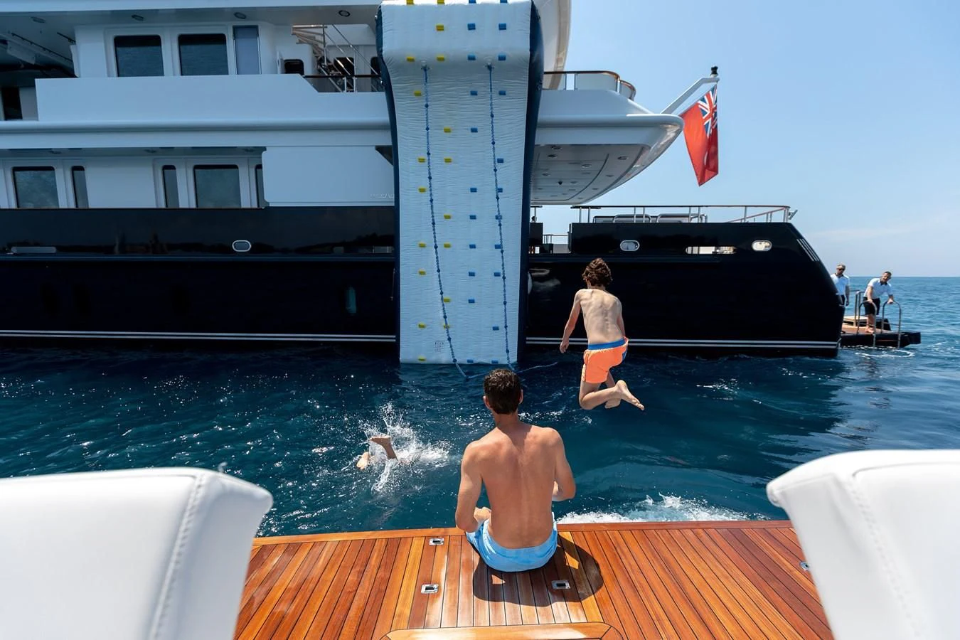 a couple of people in the water aboard TREEHOUSE Yacht for Sale