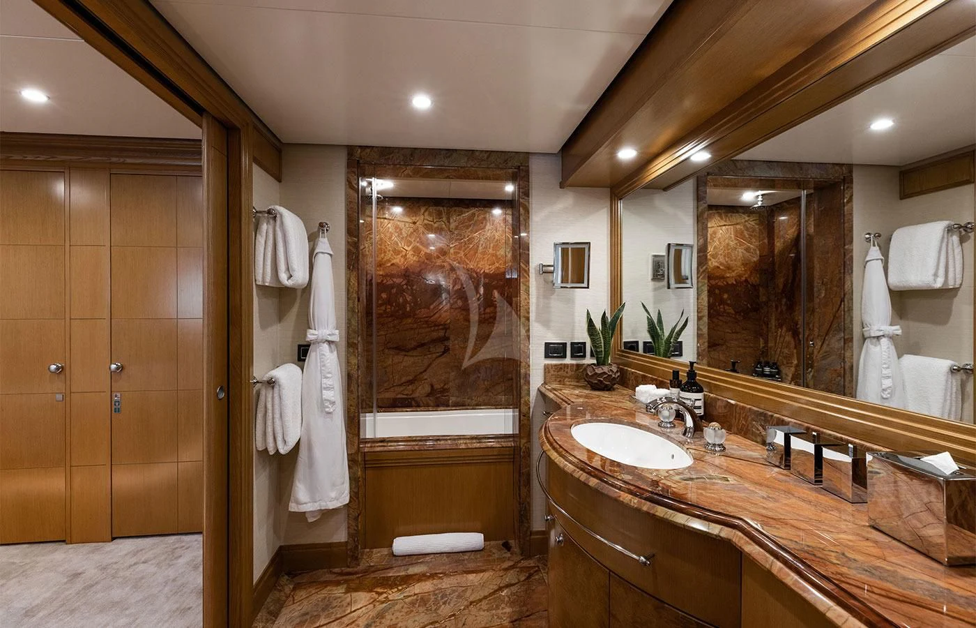 a bathroom with a large mirror aboard TREEHOUSE Yacht for Sale
