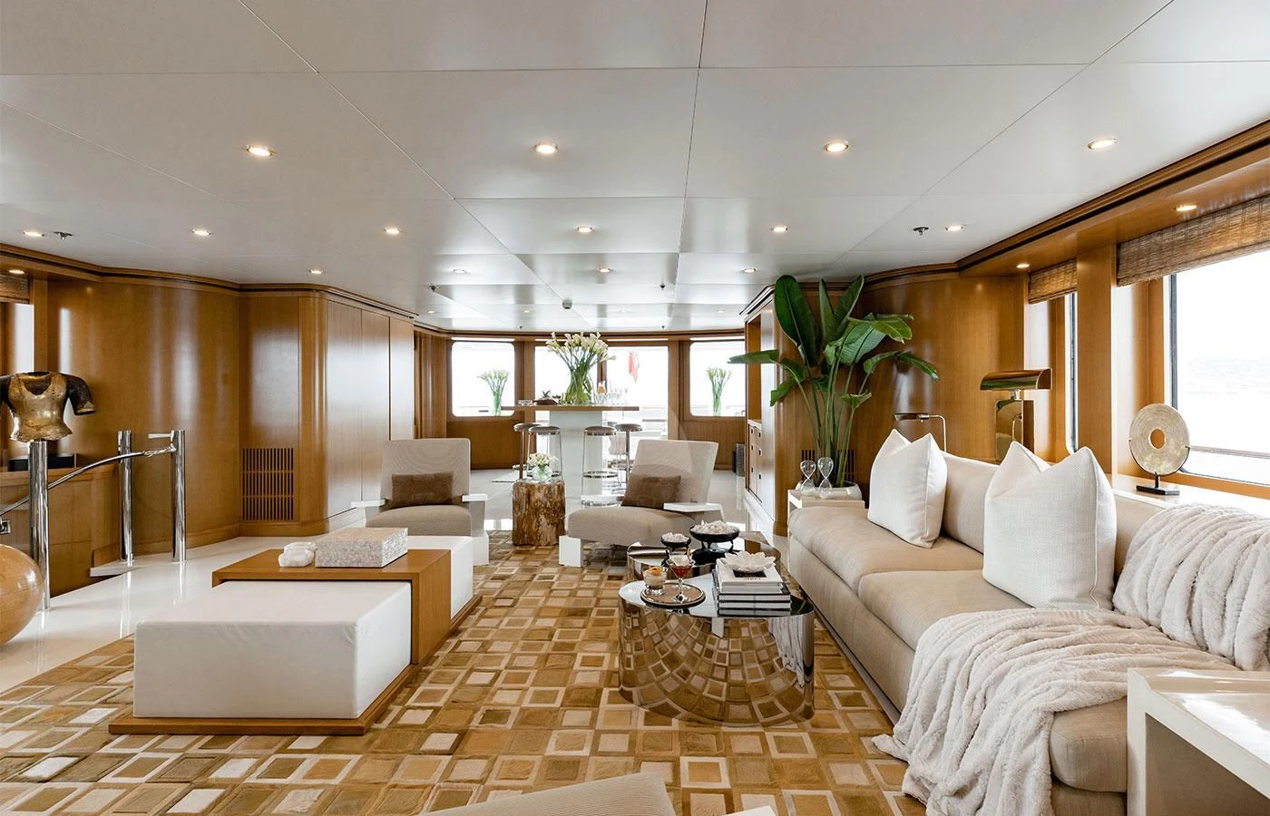 a large living room with a tile floor aboard TREEHOUSE Yacht for Sale