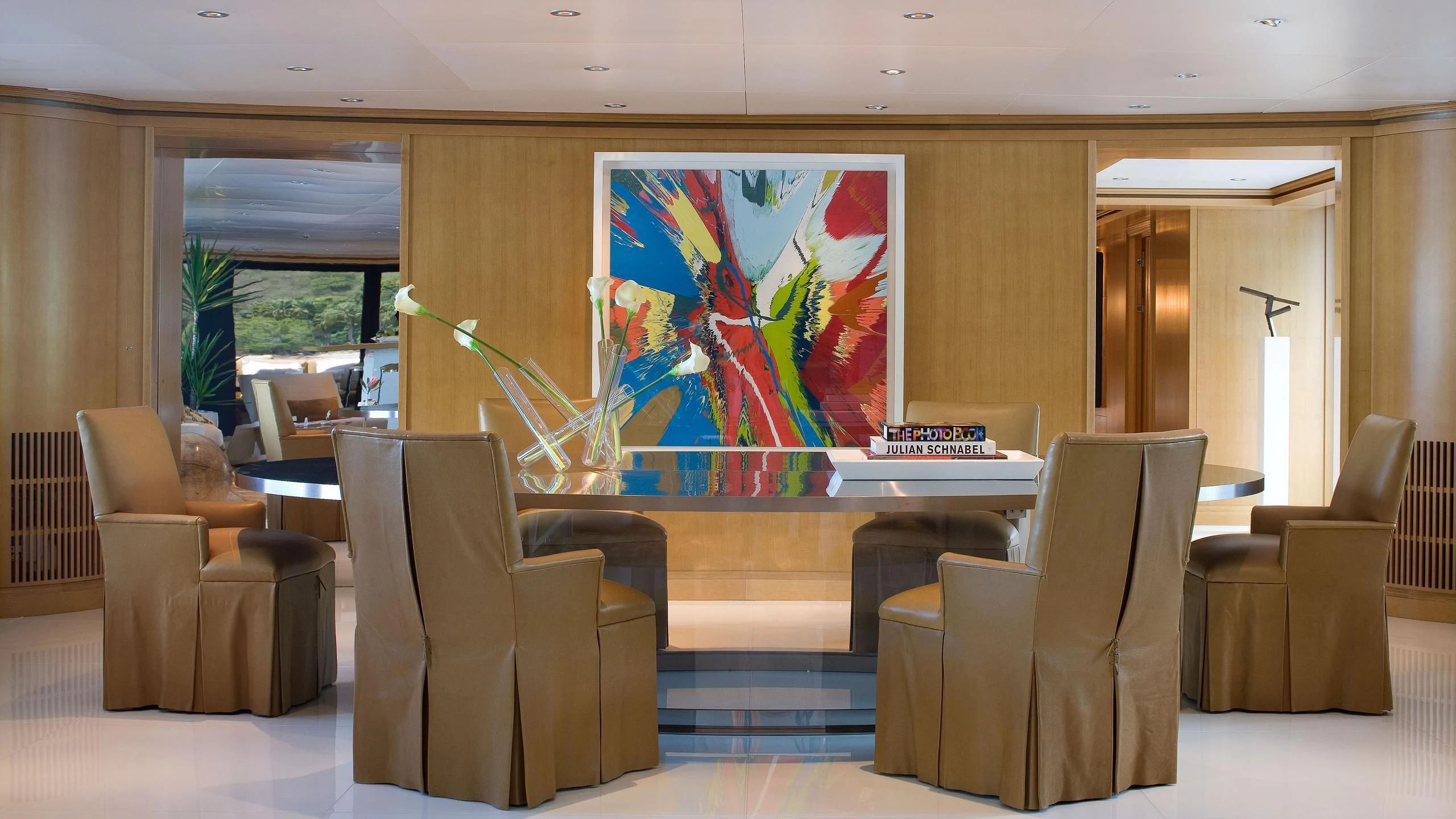 a room with chairs and a table aboard TREEHOUSE Yacht for Sale