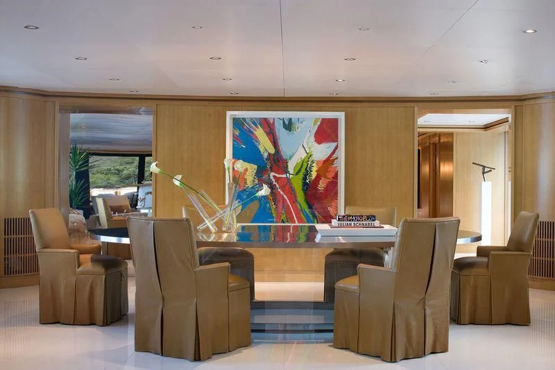 a room with chairs and a table aboard TREEHOUSE Yacht for Sale