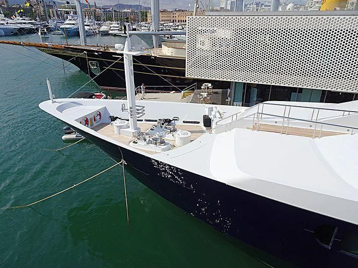 a large white boat in a large body of water aboard TREEHOUSE Yacht for Sale
