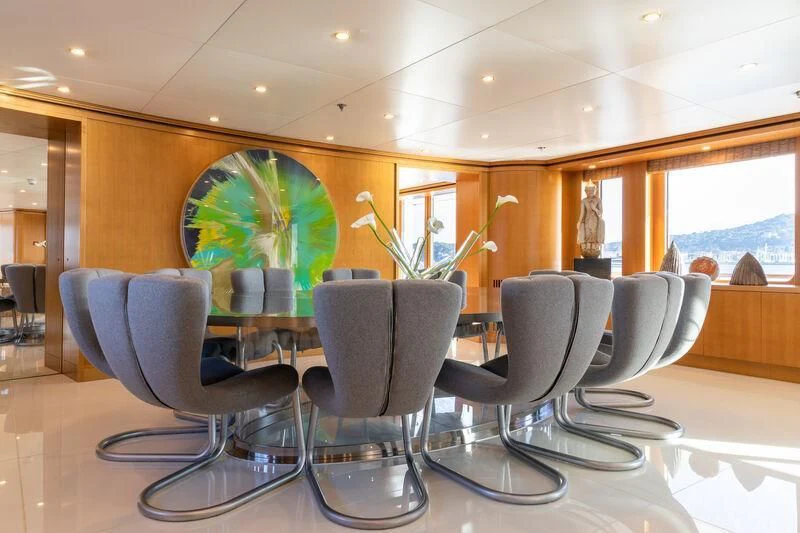 a room with chairs and a table aboard TREEHOUSE Yacht for Sale