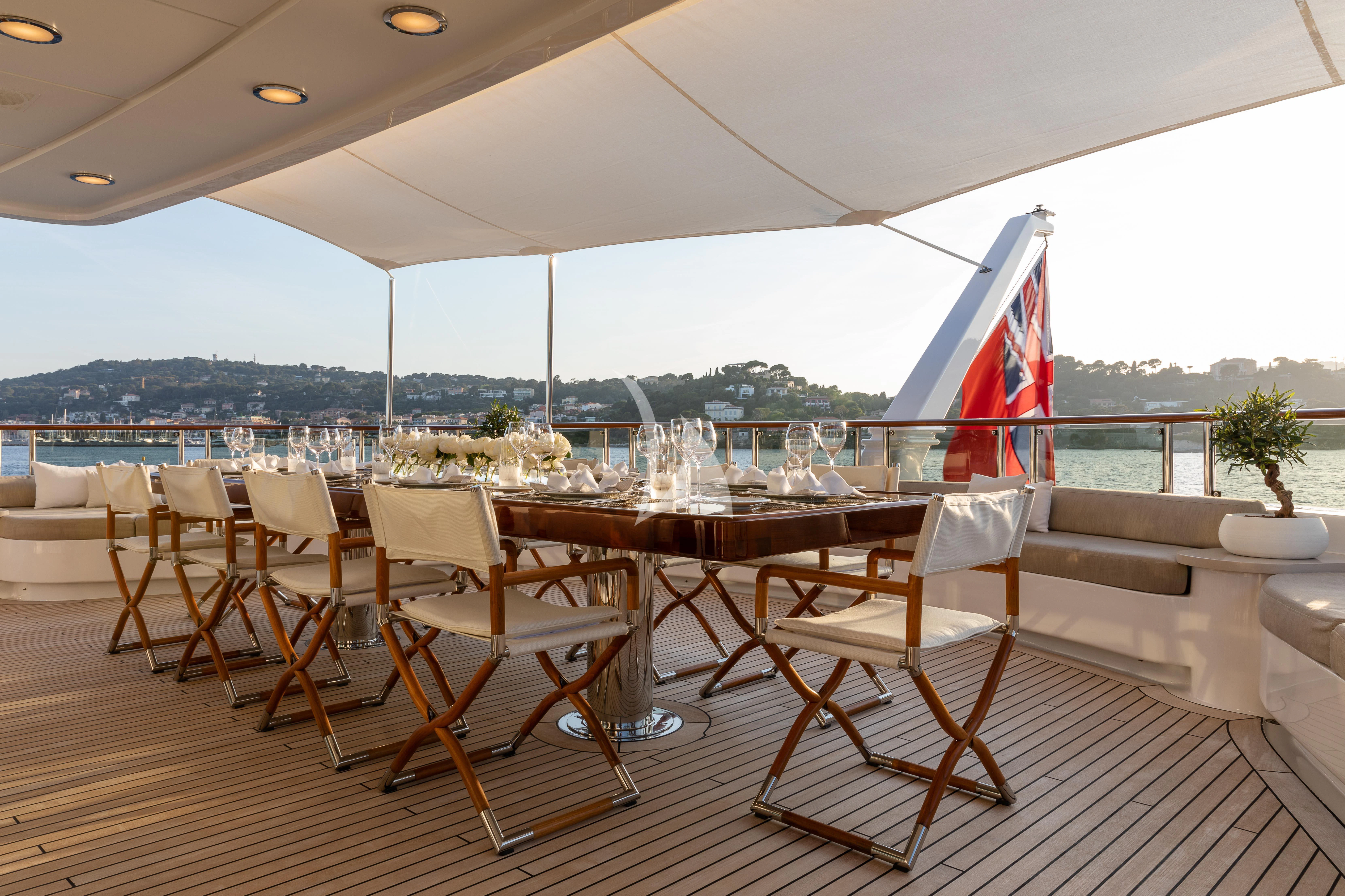 a flag on a table aboard TREEHOUSE Yacht for Sale