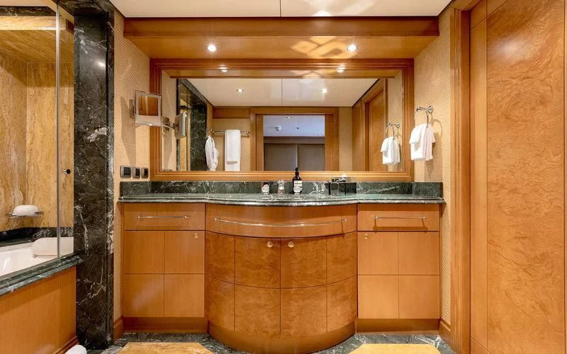 a bathroom with a large mirror aboard TREEHOUSE Yacht for Sale