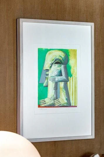 a framed picture of a person aboard TREEHOUSE Yacht for Sale