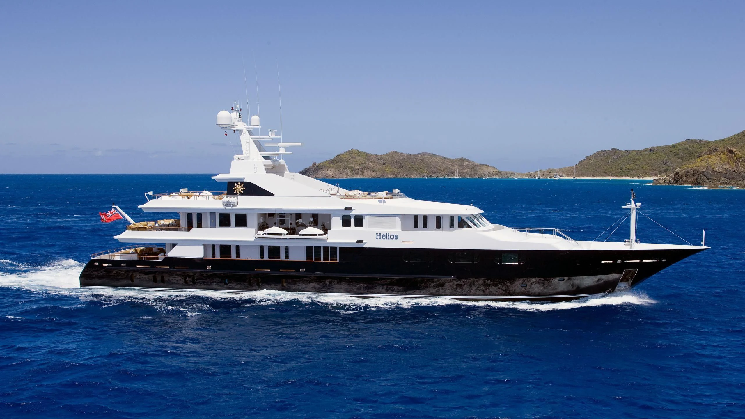 a large boat on the water aboard TREEHOUSE Yacht for Sale