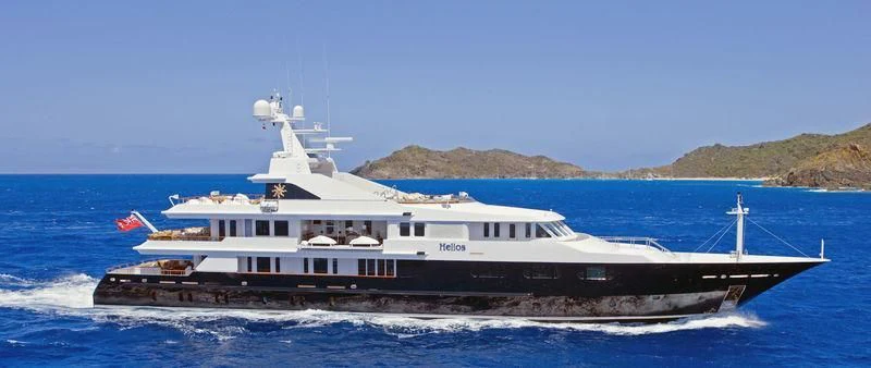 a large white boat on the water aboard TREEHOUSE Yacht for Sale