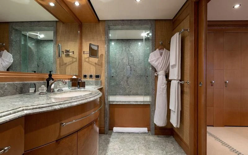 a bathroom with a sink and a mirror aboard TREEHOUSE Yacht for Sale