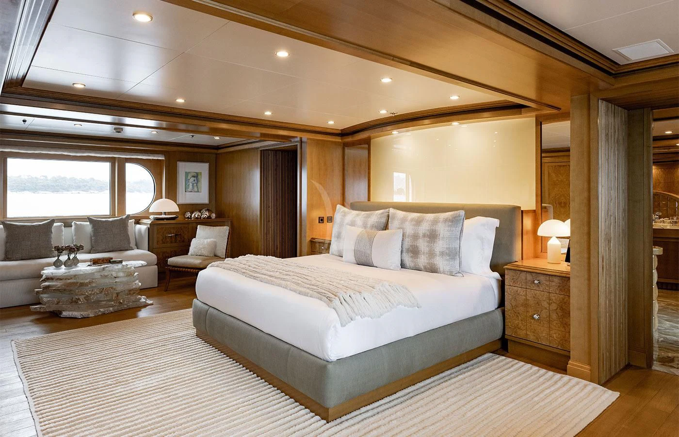 a large bedroom with a large bed aboard TREEHOUSE Yacht for Sale