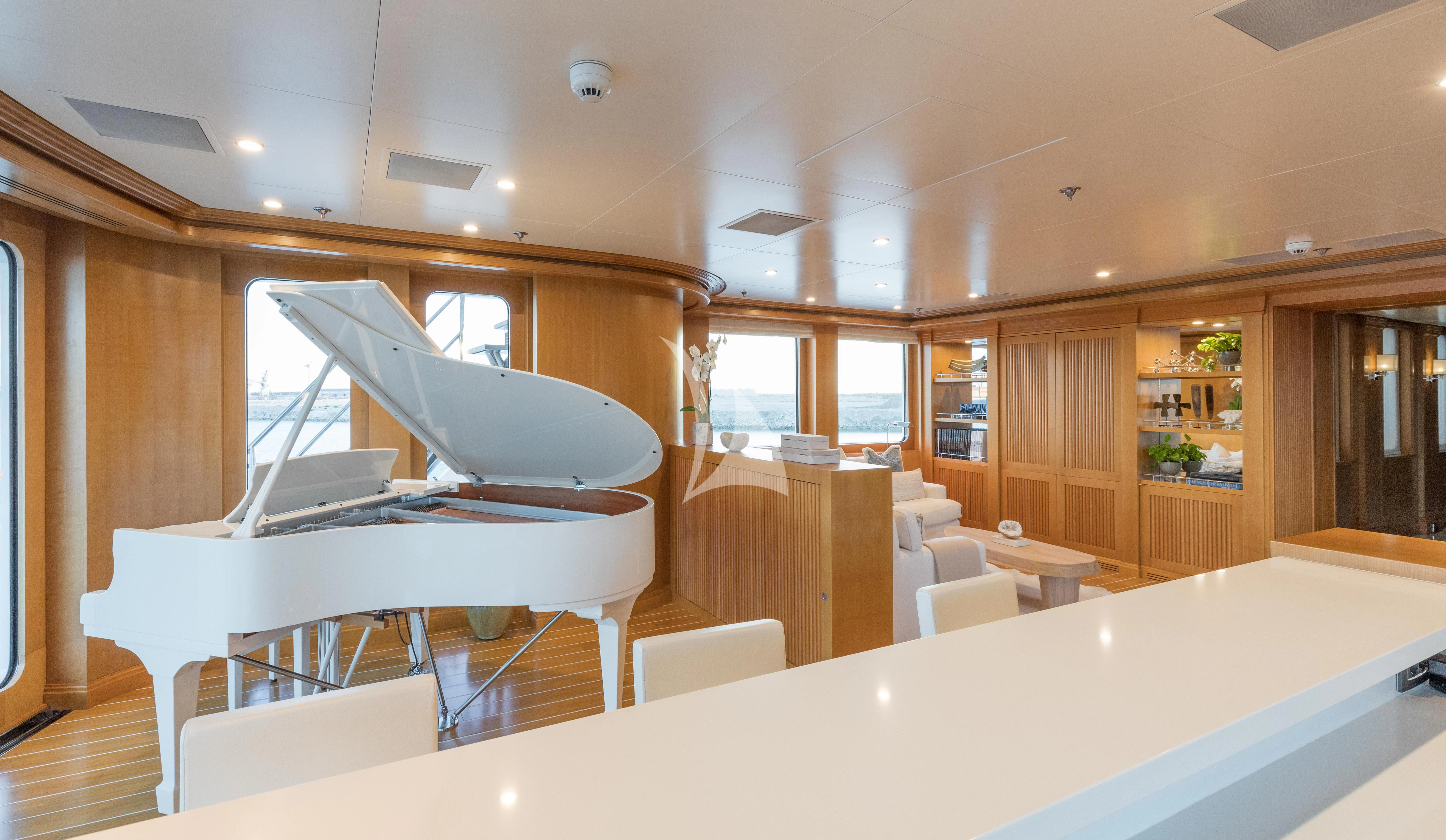 a room with a table and chairs aboard TREEHOUSE Yacht for Sale