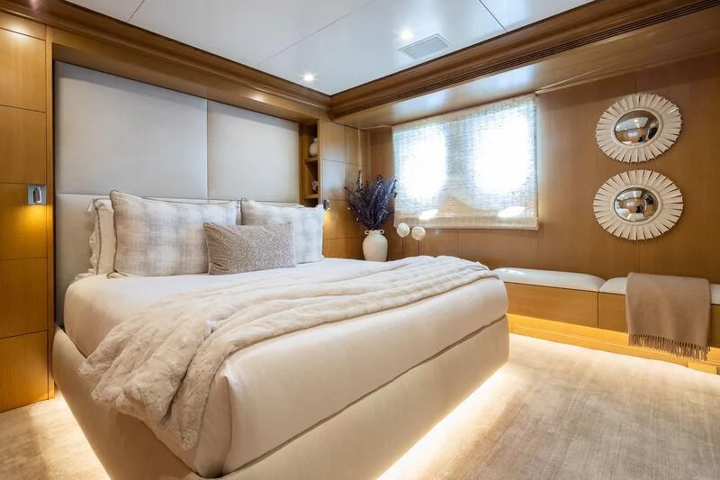 a large bed in a room aboard TREEHOUSE Yacht for Sale